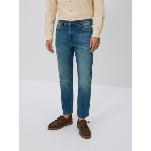 Reserved - Jeansy carrot slim z efektem sprania - indigo jeans ze sklepu Reserved w kategorii Jeansy męskie - zdjęcie 186432212