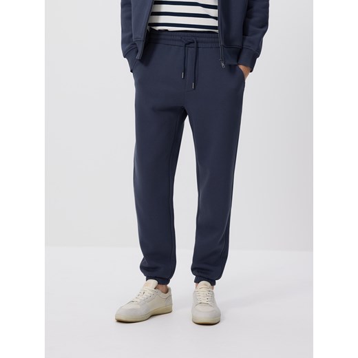 Reserved - Spodnie dresowe regular fit - granatowy ze sklepu Reserved w kategorii Spodnie męskie - zdjęcie 186443093