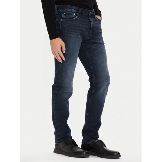 HUGO Jeansy Ash 50541568 Granatowy Slim Fit ze sklepu MODIVO w kategorii Jeansy męskie - zdjęcie 186450424