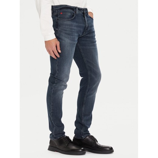 HUGO Jeansy 50547247 Granatowy Extra Slim Fit ze sklepu MODIVO w kategorii Jeansy męskie - zdjęcie 186450454