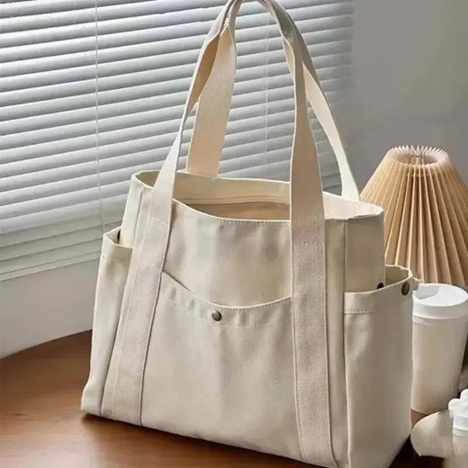 Płócienna torba shopper z kieszeniami - Beżowy ze sklepu Intimica.pl w kategorii Torby Shopper bag - zdjęcie 186456170