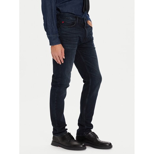 HUGO Jeansy 50547255 Granatowy Slim Fit ze sklepu MODIVO w kategorii Jeansy męskie - zdjęcie 186457753