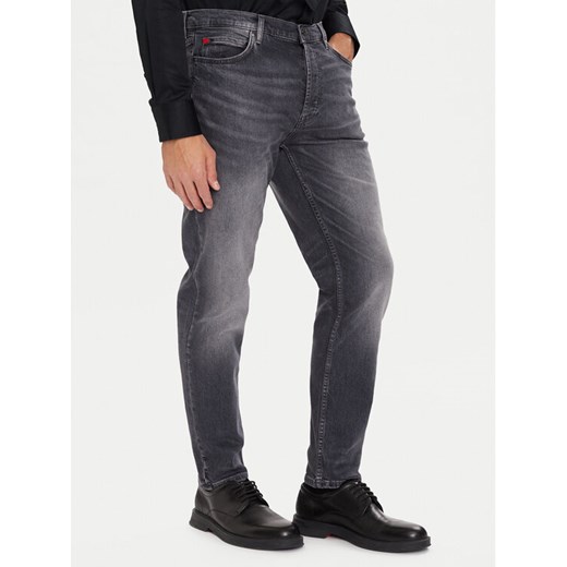 HUGO Jeansy 50547274 Szary Tapered Fit ze sklepu MODIVO w kategorii Jeansy męskie - zdjęcie 186457774