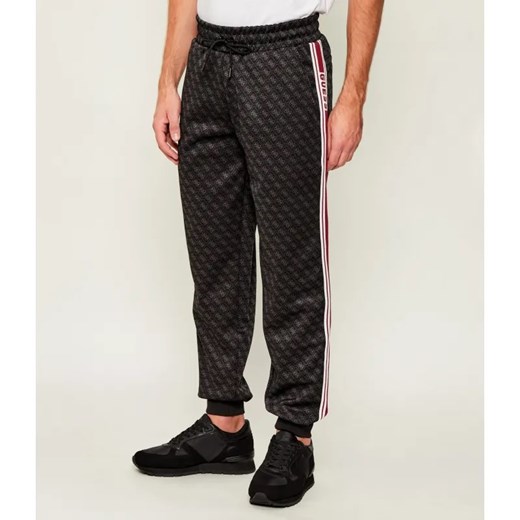 GUESS ACTIVE Spodnie dresowe PARIMO | Regular Fit ze sklepu Gomez Fashion Store w kategorii Spodnie męskie - zdjęcie 186470643