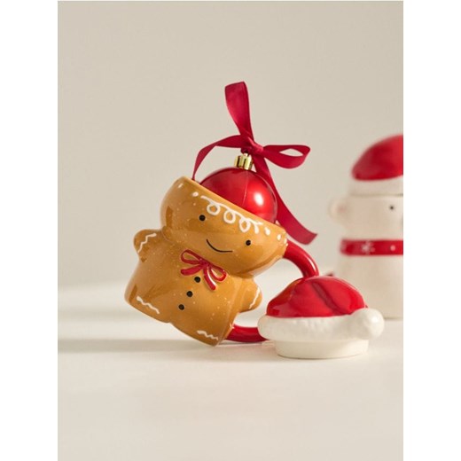 Sinsay - Ceramiczny kubek z pokrywką w kształcie ludzika piernikowego - wielobarwny - id: 786GQ-MLC - marki Sinsay - 186472134 Sinsay - Ceramiczny kubek z pokrywką w kształcie ludzika piernikowego - wielobarwny ze sklepu Sinsay w kategorii Kubki - zdjęcie 186472134