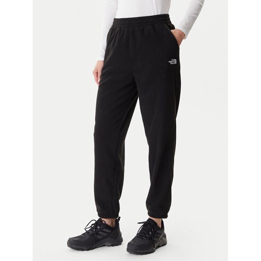 The North Face Spodnie dresowe Glacier NF0A8DQR Czarny Regular Fit ze sklepu MODIVO w kategorii Spodnie damskie - zdjęcie 186484262