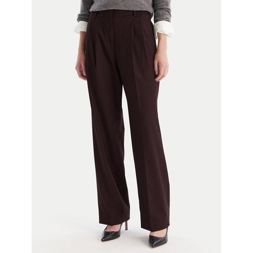 Tommy Hilfiger Spodnie materiałowe WW0WW48358 Bordowy Relaxed Fit ze sklepu MODIVO w kategorii Spodnie damskie - zdjęcie 186484322