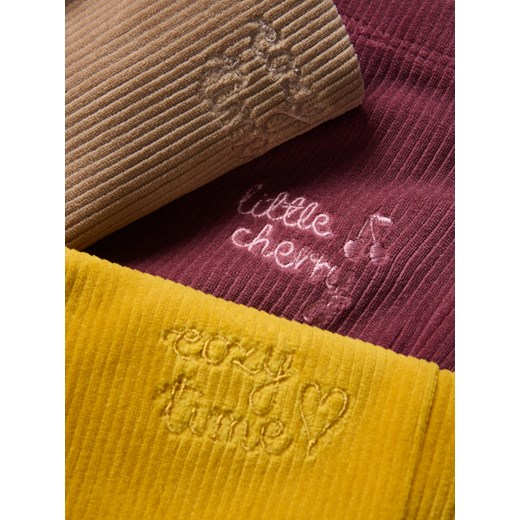 Reserved - Dzianinowe spodnie z haftem - bursztynowy ze sklepu Reserved w kategorii Spodnie dziewczęce - zdjęcie 186502130