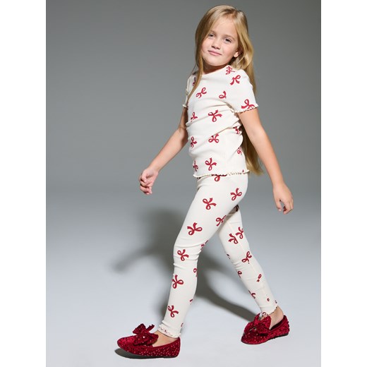 Sinsay - Prążkowane legginsy ze wzorem w kokardy - wielobarwny Sinsay 140 (9-10 l) Sinsay