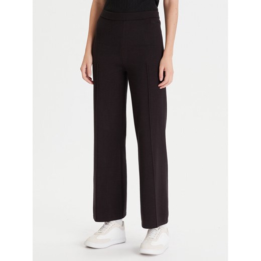 Calvin Klein Spodnie dzianinowe LV044D368G Czarny Wide Leg ze sklepu MODIVO w kategorii Spodnie damskie - zdjęcie 186521730