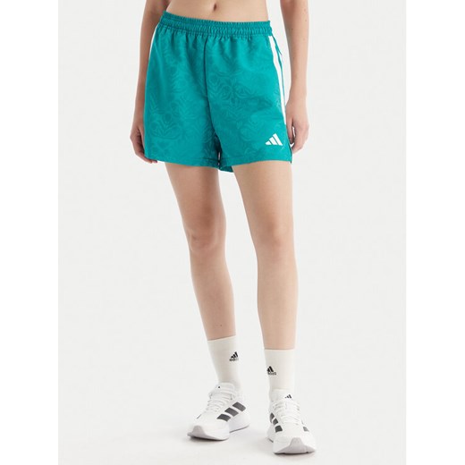 adidas Szorty sportowe Tiro x Common Goal JL9208 Turkusowy Loose Fit ze sklepu MODIVO w kategorii Szorty - zdjęcie 186525570