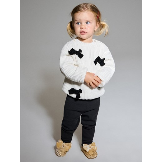 Sinsay - Sweter z kokardami - kremowy Sinsay 86 (12-18 m) Sinsay