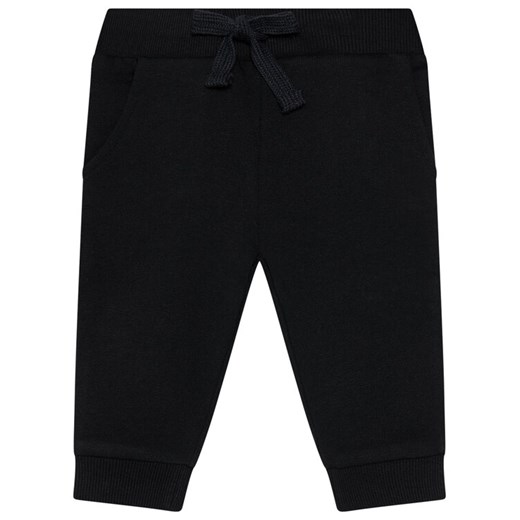 Guess Spodnie dresowe L93Q24 KAUG0 Czarny Regular Fit ze sklepu MODIVO w kategorii Spodnie chłopięce - zdjęcie 186553870