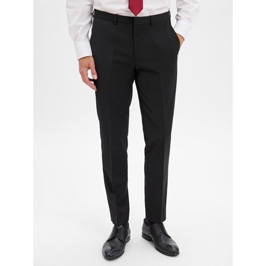 HUGO Spodnie - Hesten Mężczyźni Super Slim Fit czarny jednolity ze sklepu vangraaf w kategorii Spodnie męskie - zdjęcie 186570482