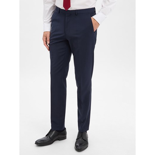 HUGO Spodnie - Hesten Mężczyźni Super Slim Fit granatowy jednolity ze sklepu vangraaf w kategorii Spodnie męskie - zdjęcie 186570483