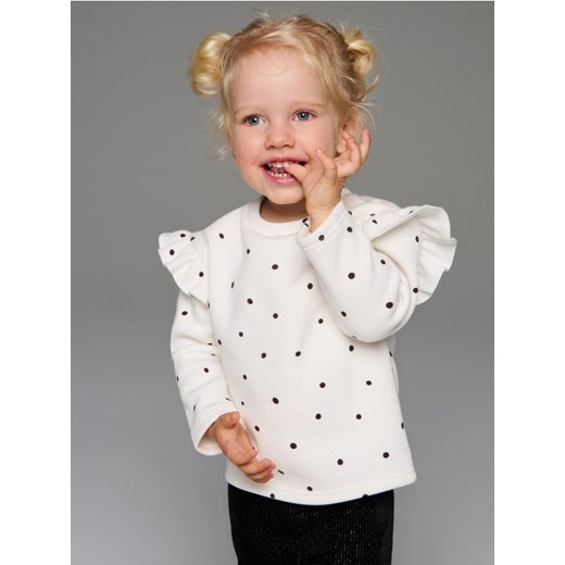 Sinsay - Ocieplana bluzka z długim rękawem w kropki - kremowy - id: 131FT-01X - marki Sinsay - 186573111 Sinsay - Ocieplana bluzka z długim rękawem w kropki - kremowy ze sklepu Sinsay w kategorii Kaftaniki i bluzki - zdjęcie 186573111