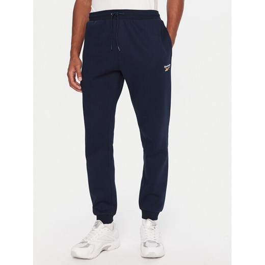 Reebok Spodnie dresowe RK25146CCM Granatowy Regular Fit ze sklepu MODIVO w kategorii Spodnie męskie - zdjęcie 186576563