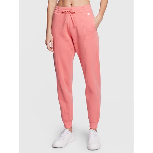 Champion Spodnie dresowe Legacy Rib Cuff 115411 Różowy Regular Fit ze sklepu MODIVO w kategorii Spodnie damskie - zdjęcie 186595581