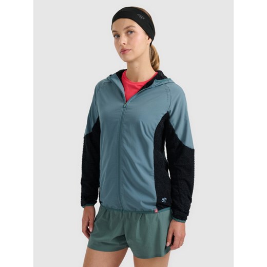 Damska bluza do biegania w terenie 4F 4FWAW25TFSWF584 - zielona ze sklepu Sportstylestory.com w kategorii Bluzy damskie - zdjęcie 186605104
