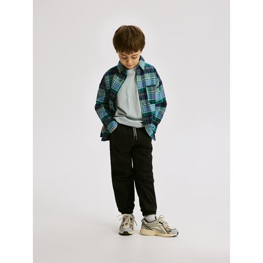 Reserved - Wysokoelastyczne spodnie jogger - czarny Reserved 146 (10 lat) Reserved