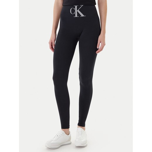 Calvin Klein Legginsy 701233380 Czarny Slim Fit ze sklepu MODIVO w kategorii Spodnie damskie - zdjęcie 186680113
