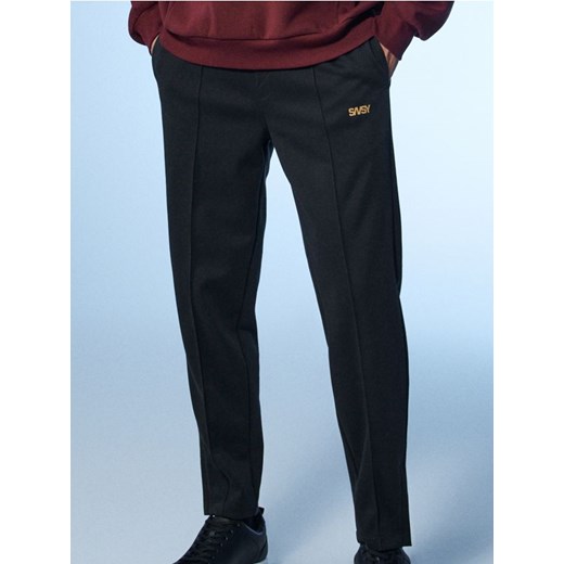 Sinsay - Spodnie tapered fit - granatowy ze sklepu Sinsay w kategorii Spodnie męskie - zdjęcie 186702910