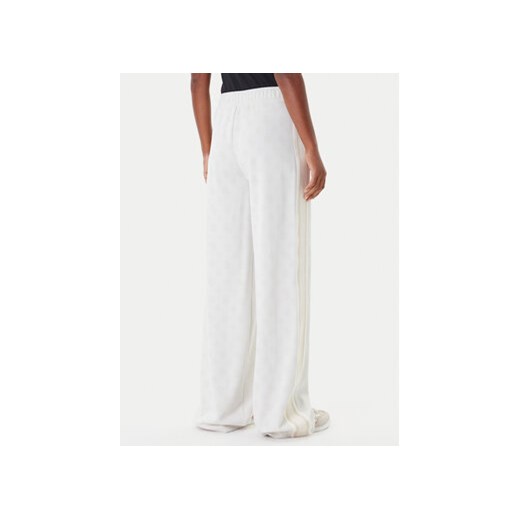Guess Spodnie dresowe V5YB10 K0282 Écru Relaxed Fit Guess XXS MODIVO
