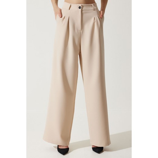 Happiness Istanbul Spodnie w kolorze kremowym Happiness Istanbul 42 wyprzedaż Limango Polska