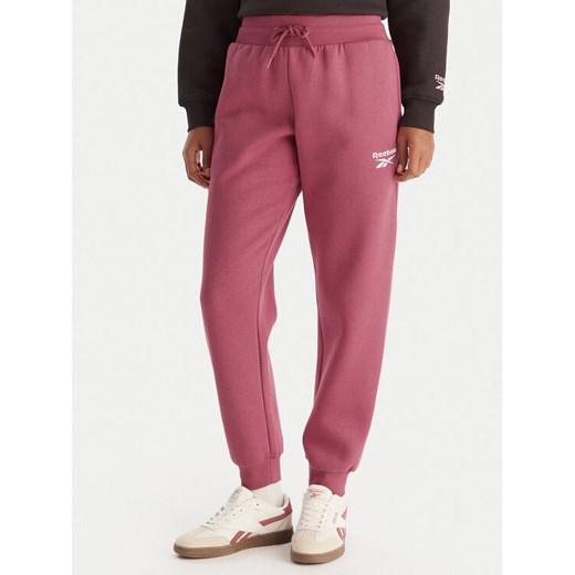 Reebok Spodnie dresowe Erika RK25164CCW Różowy Regular Fit ze sklepu MODIVO w kategorii Spodnie damskie - zdjęcie 186795500