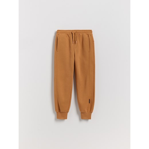 Reserved - Dzianinowe joggery - brązowy ze sklepu Reserved w kategorii Spodnie chłopięce - zdjęcie 186797491