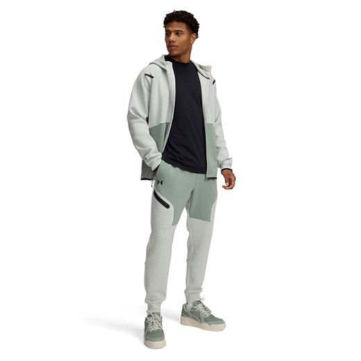 Męskie spodnie treningowe Under Armour UA Unstoppable Flc Jgr Eu - zielone ze sklepu Sportstylestory.com w kategorii Spodnie męskie - zdjęcie 186805431