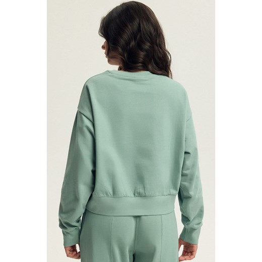 Esotiq bluza damska Bloovii Keithan 43785-07X, Kolor matcha, Rozmiar M, BLOOVII - id: 220905 - marki Bloovii - 187057360 Esotiq bluza damska Bloovii Keithan 43785-07X, Kolor matcha, Rozmiar M, BLOOVII ze sklepu Intymna w kategorii Bluzy damskie - zdjęcie 187057360