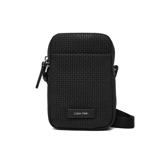 Saszetka Calvin Klein Embossed Woven Slim Reporter LV04D3221G Czarny - id: 8721224850517 - marki Calvin Klein - 187188051 Saszetka Calvin Klein Embossed Woven Slim Reporter LV04D3221G Czarny ze sklepu eobuwie.pl w kategorii Saszetki - zdjęcie 187188051