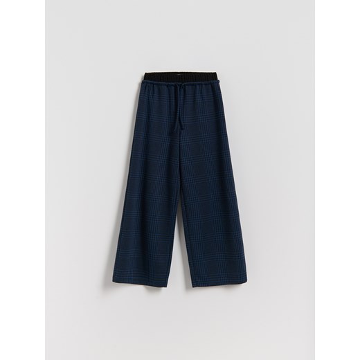 Reserved - Luźne spodnie w kratę - wielobarwny ze sklepu Reserved w kategorii Spodnie dziewczęce - zdjęcie 187196610