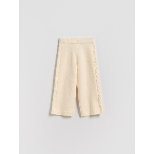 Reserved - Dzianinowe spodnie - kremowy ze sklepu Reserved w kategorii Spodnie dziewczęce - zdjęcie 187198390
