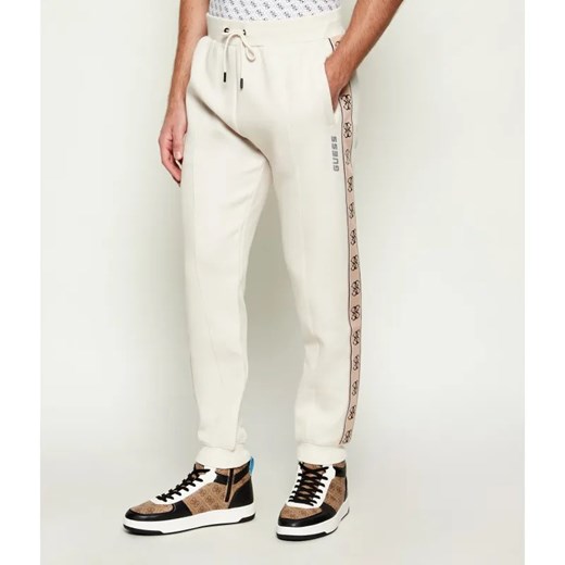 GUESS ACTIVE Spodnie dresowe Mickey | Regular Fit ze sklepu Gomez Fashion Store w kategorii Spodnie męskie - zdjęcie 187212542