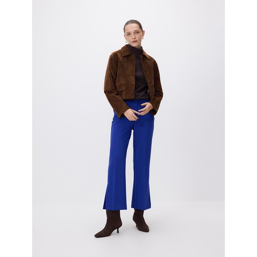 Reserved - Spodnie z rozcięciami petite - niebieski Reserved L Reserved