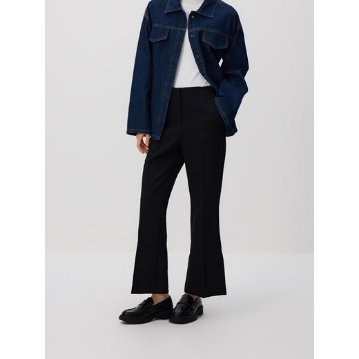 Reserved - Spodnie z rozcięciami petite - czarny ze sklepu Reserved w kategorii Spodnie damskie - zdjęcie 187219650