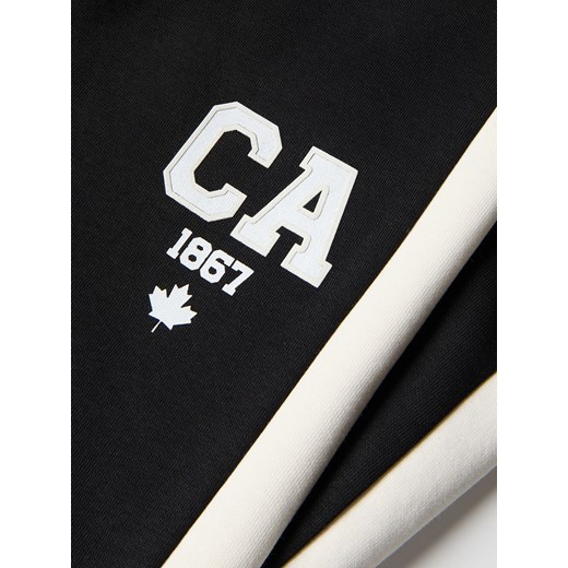 Reserved - Spodnie dresowe z lampasami - czarny Reserved 128 (7-8 lat) Reserved