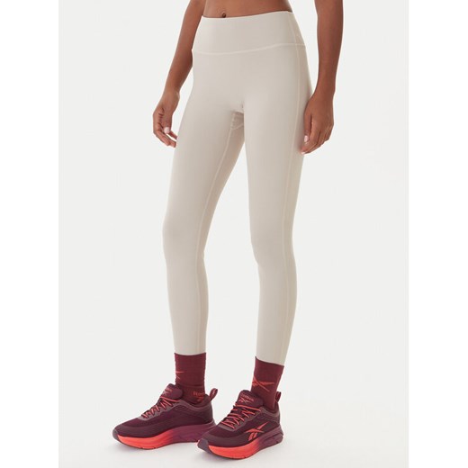 Reebok Legginsy Reebok X Ewa Chodakowska RK25311CCW Beżowy Slim Fit ze sklepu MODIVO w kategorii Spodnie damskie - zdjęcie 187249523