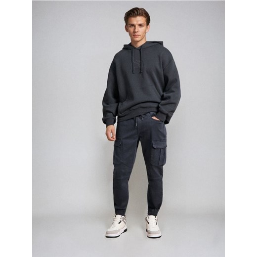 Sinsay - Jeansy regular jogger cargo - niebieski - id: 452FB-57X - marki Sinsay - 187266324 Sinsay - Jeansy regular jogger cargo - niebieski ze sklepu Sinsay w kategorii Jeansy męskie - zdjęcie 187266324