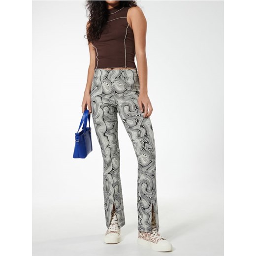 Sinsay - Prążkowana bluzka bez rękawów z półgolfem - brązowy ze sklepu Sinsay w kategorii Bluzki damskie - zdjęcie 187266571