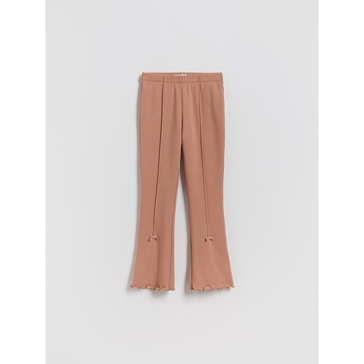 Reserved - Ocieplane legginsy flare z kokardkami - brązowy ze sklepu Reserved w kategorii Spodnie dziewczęce - zdjęcie 187279742