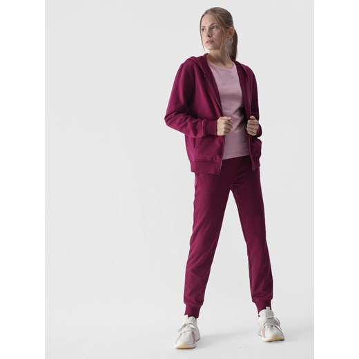 Damskie spodnie dresowe joggery 4F 4FWMM00TTROF0945 - różowe ze sklepu Sportstylestory.com w kategorii Spodnie damskie - zdjęcie 187293703