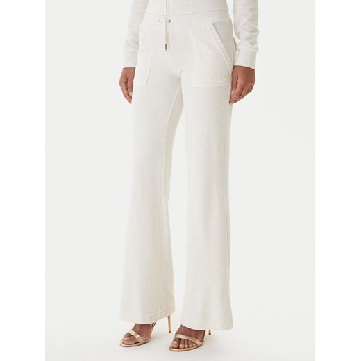 Juicy Couture Spodnie dresowe Layla JCSEBJ001G Beżowy Regular Fit ze sklepu MODIVO w kategorii Spodnie damskie - zdjęcie 187306461