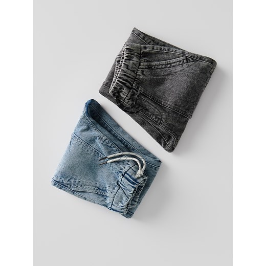 Reserved - Jeansy jogger fit - niebieski Reserved 128 (7-8 lat) Reserved okazyjna cena