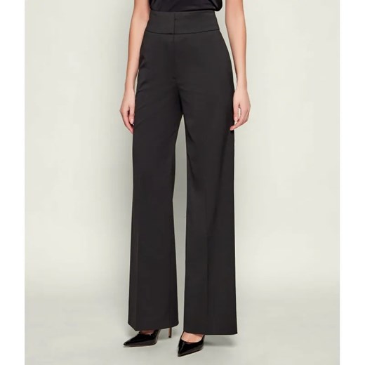 HUGO Spodnie Himia | flare fit | z dodatkiem wełny ze sklepu Gomez Fashion Store w kategorii Spodnie damskie - zdjęcie 187327201