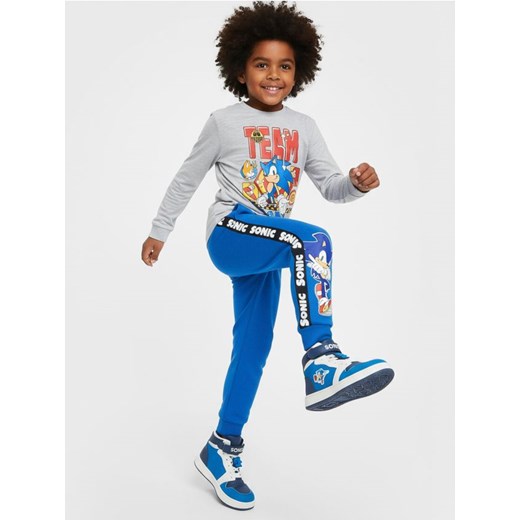 Sinsay - Spodnie z nadrukiem i ozdobnymi lampasami Sonic the Hedgehog - niebieski ze sklepu Sinsay w kategorii Spodnie chłopięce - zdjęcie 187333180