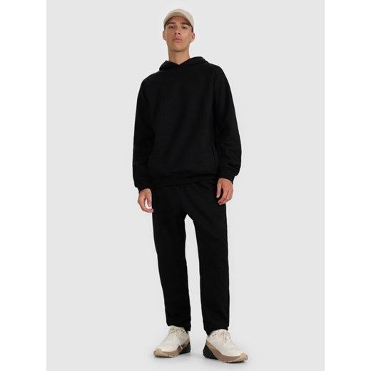 Męskie spodnie dresowe 4F 4FWAW25TTROM1251 - czarne ze sklepu Sportstylestory.com w kategorii Spodnie męskie - zdjęcie 187343002