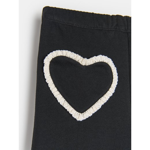 Sinsay - Spodnie dresowe wide leg - czarny Sinsay 134 (8-9 l) Sinsay